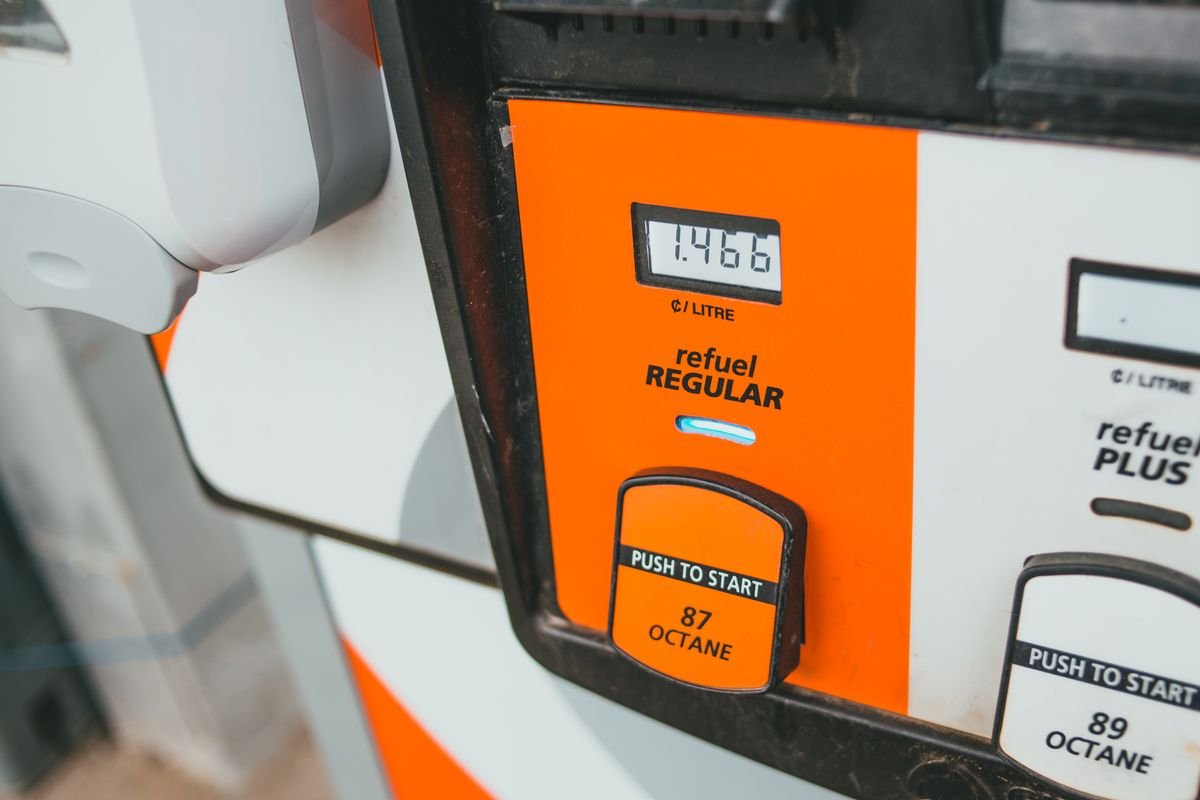 Close-up of a gas pump display showing the price per gallon and 87 octane grade