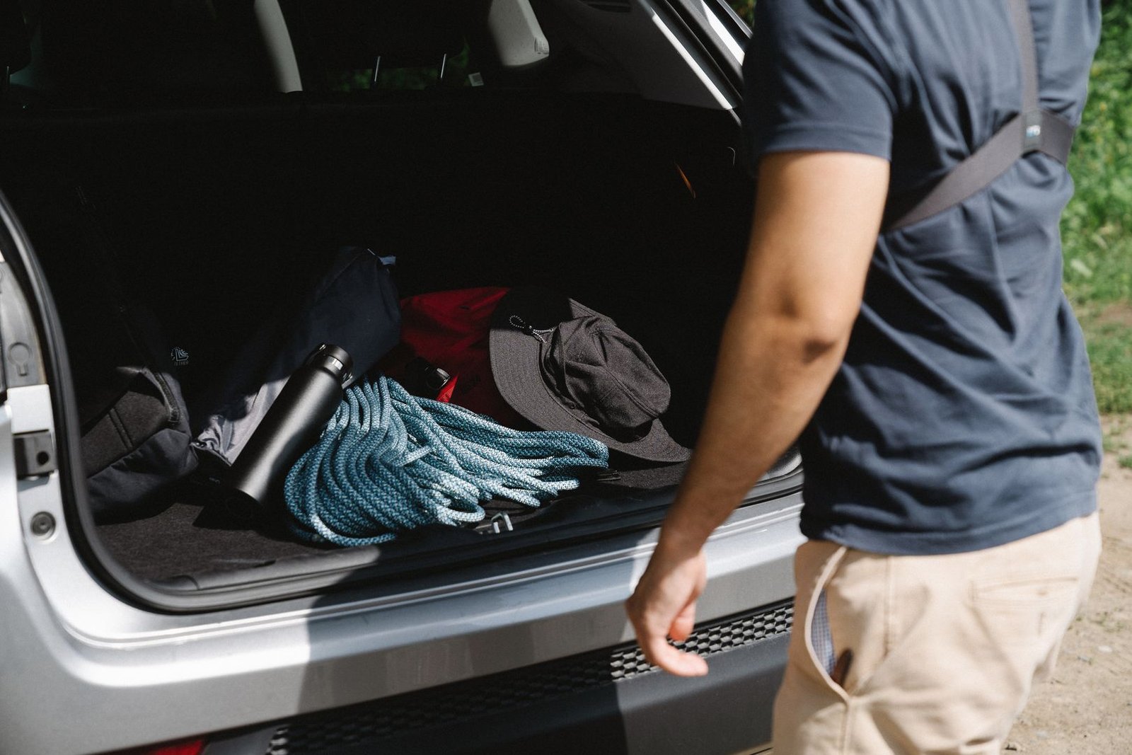 Opened car trunk showing storage space, relevant to Hawaii's open container storage rule