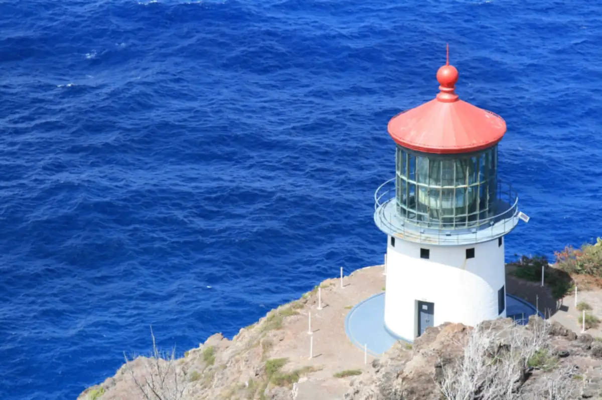 Makapuu Point Lighthouse on the cliff above the ocean
