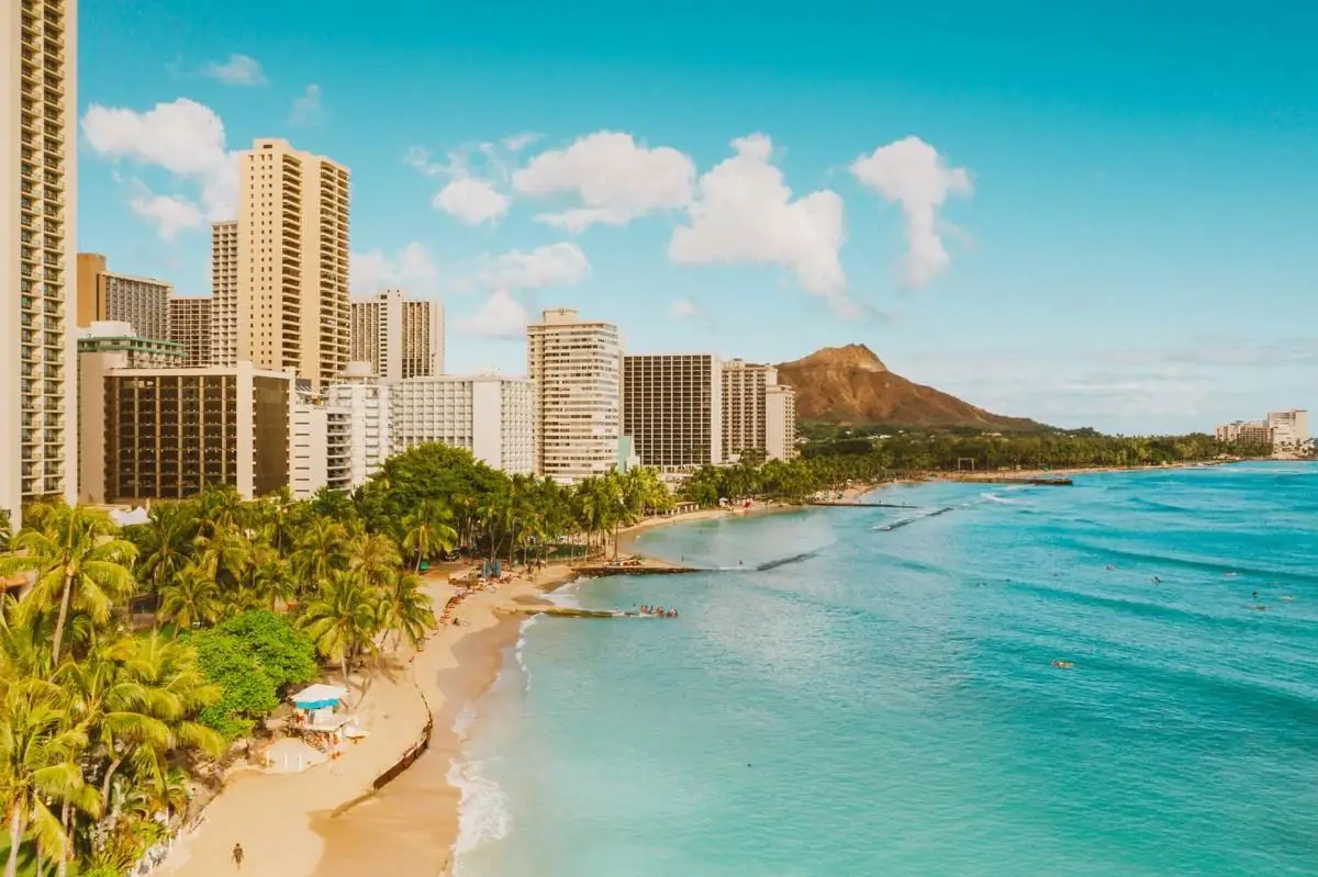 Waikiki Beach with high-rise hotels and Diamond Head in the background